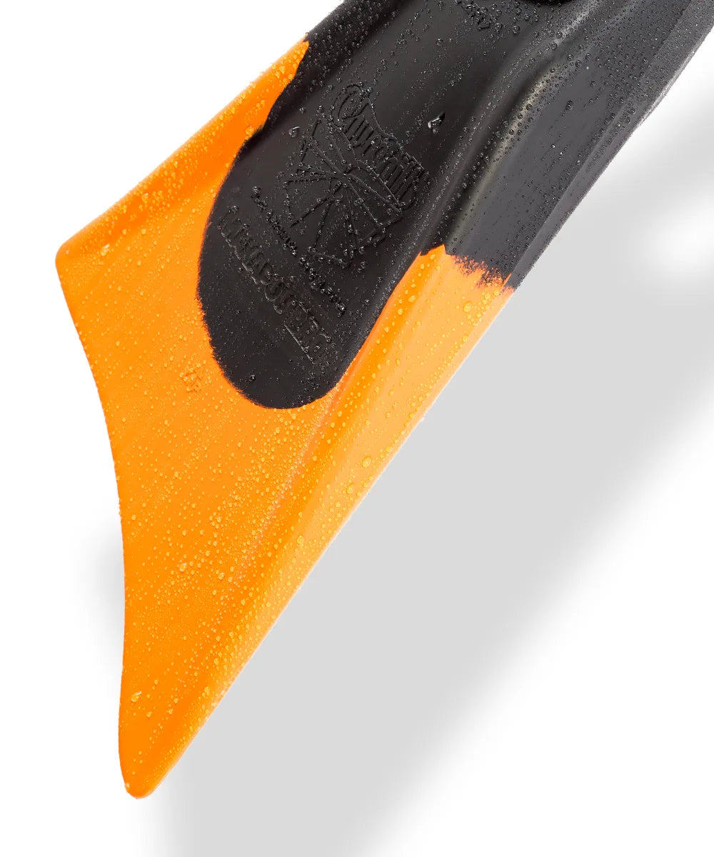 Orange and black swimfin with water droplets, showcasing durable design for swimming and snorkeling