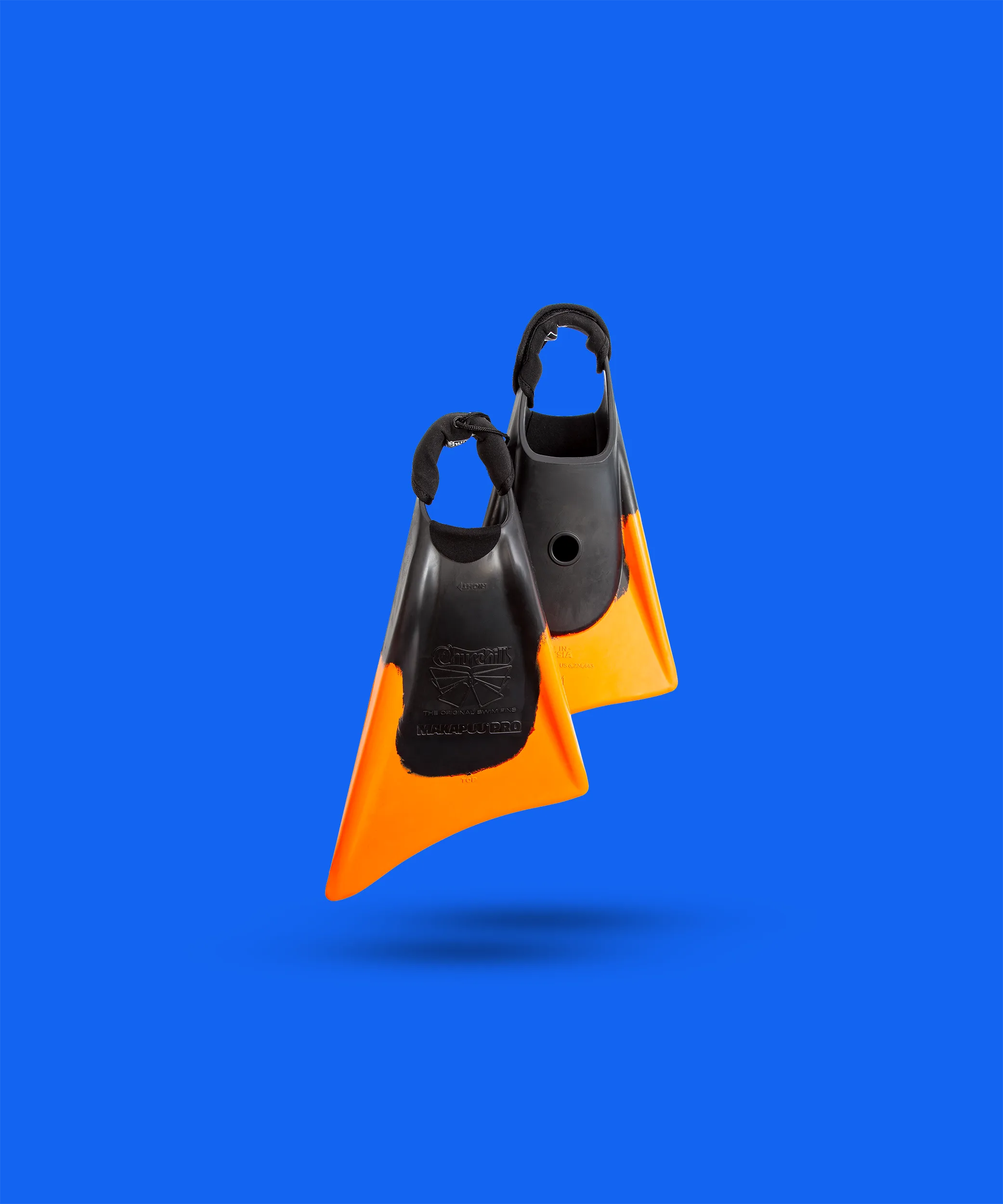 Black and orange swim fins with Churchill branding on blue background