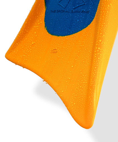 Vibrant orange swim fin with blue heel grip, water droplets highlighting durability and performance.