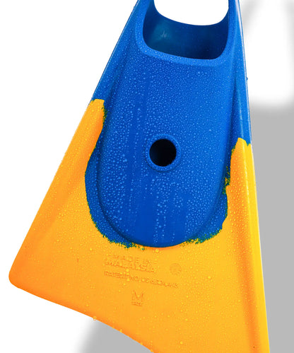 Blue and yellow swimfin with water droplets, showcasing durable design for swimming